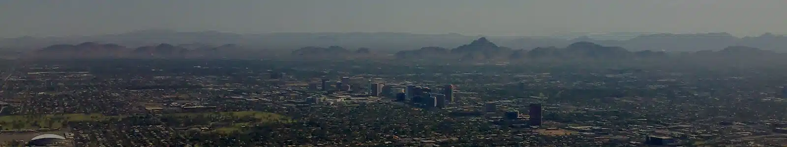 High elevation view of cityscape at sunset