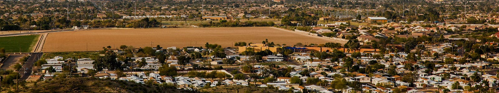 wide-angle view of neighborhoods and parks in the Arizona west valley