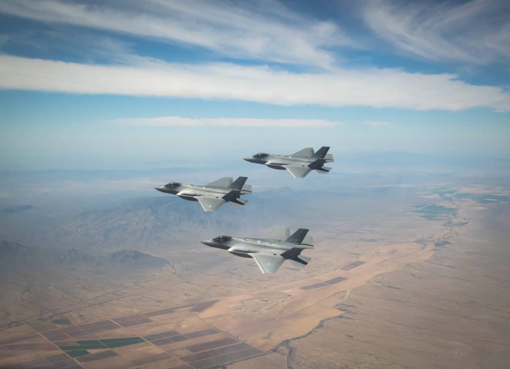 Fighter jets flying above phoenix landscape