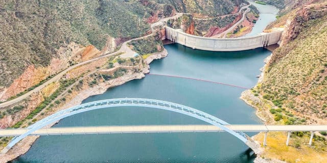 A dam and bridge sit over a watershed in Arizona.