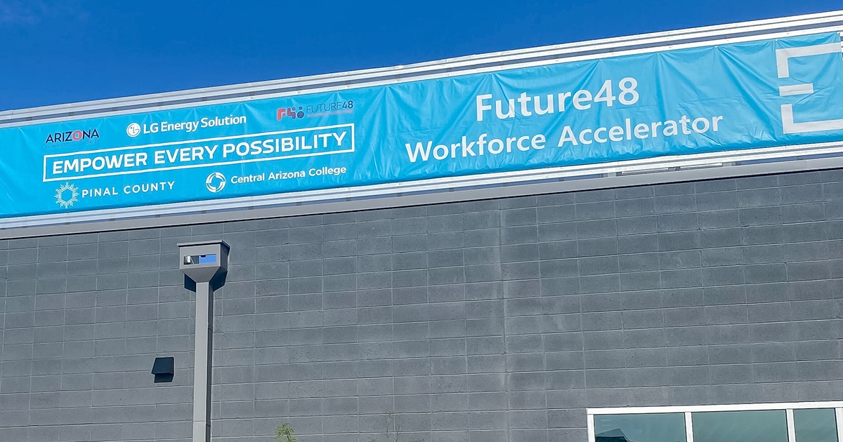 A blue banner on a commercial building showcases the Future48 Workforce Accelerator.
