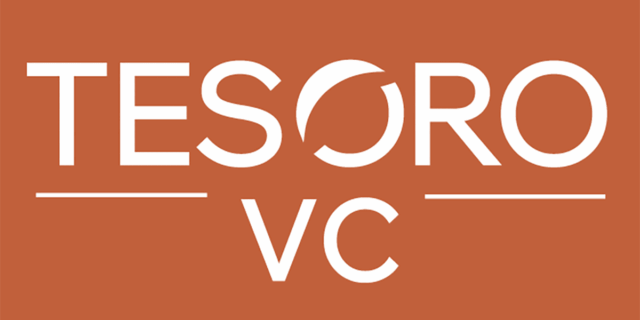 White Tesoro VC lettering in all capital letters on a rust-colored background.